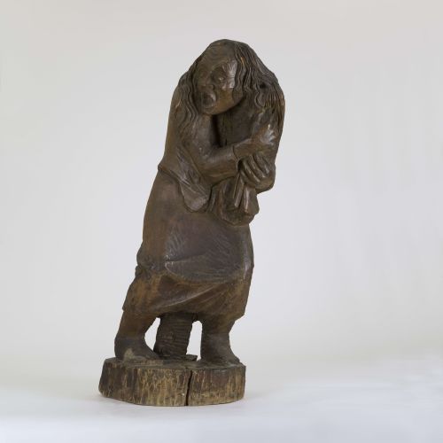 Es handelt sich um eine expressionistische, kleinformatige Holzskulptur eines unbekannten Künstlers aus dem frühen 20. Jahrhundert.