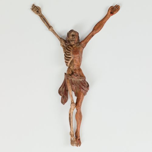 Memento Mori-Darstellung des gekreuzigten Jesus Christus in zwei Stadien, einmal mit ausgezehrtem Körper und einmal als Skelett. Sogen. 4-Nagel-Typ mit Löchern in Händen und Füßen zur Montage auf einen Untergrund